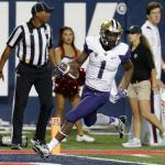 Washington wide receiver John Ross scores a touchdown against Arizona during the first half of a game Sept. 24 in Tucson, Ariz. (AP Photo/Rick Scuteri)