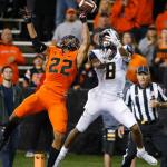 Oregon State cornerback Xavier Crawford (22) breaks up a pass intended for California&rsquo;s Demetrius Robertson during the second half of a game Oct. 8 in Corvallis, Ore. (AP Photo/Timothy J. Gonzalez)