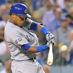 Chicago&rsquo;s Addison Russell hits his second home run in as many nights, with this shot giving the Cubs the lead in an 8-4 victory over the Dodgers in Game 5 of the NLCS on Thursday night in Los Angeles. (AP Photo/Mark J. Terrill)