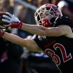 Archbishop Murphy&rsquo;s Paul Schireman makes a fingertip grab during a game against Olympic on Saturday. (Ian Terry / The Herald)
