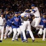 Cubs players celebrate after Game 6 of the National League Championship Series against the Dodgers on Saturday in Chicago. The Cubs won 5-0 to win the series and advance to the World Series against the Indians. (AP Photo/David J. Phillip)