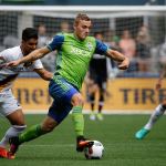 Sounders forward Jordan Morris (center) drives with the ball during an MLS match against the Galaxy on July 9 in Seattle. (AP Photo/Ted S. Warren)