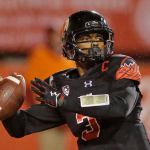 Utah quarterback Troy Williams (3) looks down field to throw during a game against USC on Sept. 23 in Salt Lake City. Williams signed with Washington as a top-ranked dual-threat quarterback in 2013. Two years later, Williams is the starter for Utah and he wants to show the fourth-ranked Huskies&rsquo; coaching staff what they missed out on. The Utes host Washington on Saturday. (AP Photo/Rick Bowmer)