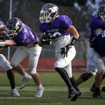 Lake Stevens&rsquo; Blake May runs the ball during a practice at Lake Stevens High School on Tuesday. (Ian Terry / The Herald)