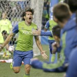 Ted S. Warren / Associated Press                                The Sounders&rsquo; Nelson Valdez (16) celebrates after he scored a goal against Sporting KC in the second half of a playoff match Thursday in Seattle.