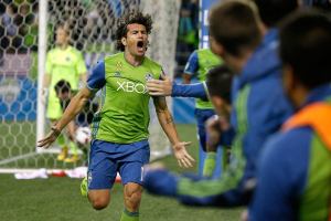 Sounders top Sporting KC 1-0 to advance in MLS playoffs