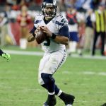 Seattle quarterback Russell Wilson (3) drops back to pass in the first half of the Seahawks&rsquo; 6-6 tie with Arizona on Sunday in Glendale, Ariz. It may be time for the Seahawks to give their starter a week off to rest his myriad injuries. (AP Photo/Rick Scuteri)