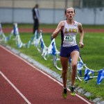 Lake Stevens&rsquo; Taylor Roe heads down the home stretch with no competitors in sight during the girls 4A District 1 cross country meet at South Whidbey High School on Saturday. (Ian Terry / The Herald)
