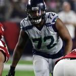Seahawks defensive end Michael Bennett (72) awaits the snap during a game against the Cardinals on Oct. 23 in Glendale, Ariz. (AP Photo/Rick Scuteri)