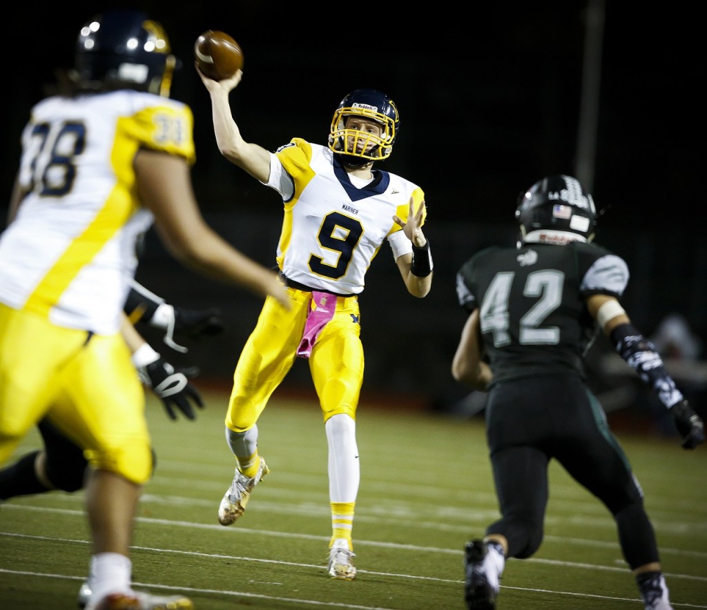 Mariner quarterback JJ Walker delivers a pass down field during a game against Jackson on Friday at Everett Memorial Stadium. (Ian Terry / The Herald)