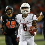 Washington State receiver Tavares Martin Jr. (8) beats the Oregon State defense to the end zone for a touchdown during the first half of a game Saturday in Corvallis, Ore. (AP Photo/Timothy J. Gonzalez)