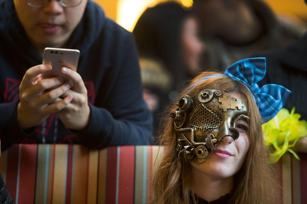 Students and faculty compete in the Hallo-Scream Contest at Everett Community College on Monday. (Andy Bronson / The Herald)