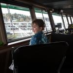 Madeline Mueller, 4, looks out from the bridge of the M/V Chelan during the Washington State Ferries&rsquo; Halloween Costume Contest on Monday. Crews on ferries picked costume winners from the walk-ons and then escorted one winner to the bridge for the duration of the run. (Andy Bronson / The Herald)