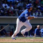 Chicago&rsquo;s Kyle Schwarber heads to first base during a spring training game against the San Francisco Giants in March. Schwarber has been added to the Cubs&rsquo; World Series roster. (AP Photo/Jeff Chiu, File)