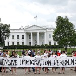 In this 2010 photo, demonstrators protests against the new Arizona immigration law in front of the White House in Washington. Hillary Clinton is crafting a domestic agenda for the start of her potential presidency that is centered on three policy priorities, each with some Republican support: a public works package that emphasizes job creation, a criminal justice overhaul, and immigration legislation, with the promise of quick executive action if necessary because of congressional opposition. (AP Photo/Pablo Martinez Monsivais, File)