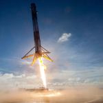 A SpaceX Falcon rocket booster lands on a platform in the Atlantic Ocean after launching a satellite into orbit in May. (SpaceX)