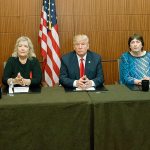 Republican presidential candidate Donald Trump (center) sits with, from right, Paula Jones, Kathy Shelton, Juanita Broaddrick and Kathleen Willey before the second presidential debate at Washington University on Sunday in St. Louis. (AP Photo/ Evan Vucci)