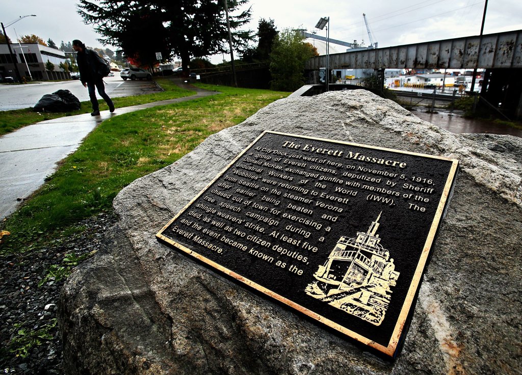 At the junction of Bond Street, Federal Avenue and Hewitt Avenue, a stone-mounted memorial plaque provides a brief description of the Everett Massacre, which occurred at the City Dock just west of this spot on Nov. 5, 1916. (Dan Bates / The Herald)
