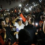 Monroe High School seniors, including Brian Pino (center in white), dance during a kickoff assembly Friday morning at the school to promote homecoming events scheduled for the upcoming week. To avoid the popularity contest that typically occurs to pick a homecoming king and queen, Monroe High School decided to change the traditional format by nominating 40 students total from all fall sports and clubs. (Ian Terry / The Herald)