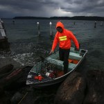 Chris Parsons, of Marysville, prepares to head out into the waters off the coast of Mukilteo to snatch up a crab pot he&rsquo;d set earlier in the morning on Saturday before more blustery conditions came in later in the evening. Parsons was able to pull in his limit of five crabs in just under two hours. (Ian Terry / The Herald)