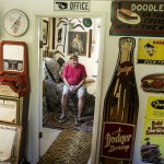 Nick Agostinelli sits in his &ldquo;jungle room&rdquo; at his home on Highway 9 near Soper Hill Road in Lake Stevens on Sept. 14. Agostinelli curates his home with different themes and is always looking for old items to turn into new projects. (Ian Terry / The Herald)