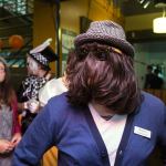 Dressed as Cousin It and using his own hair, Mike Marshall lines up to compete in the Hallo-Scream Contest at Everett Community College on Monday. (Andy Bronson / The Herald)