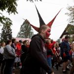 Freshman Troy Pennamen sports three red-and-black spikes in his hair. He was among about 1,500 Snohomish High School students who walked in the annual Serpentine Parade in Snohomish on Friday. (Andy Bronson / The Herald)