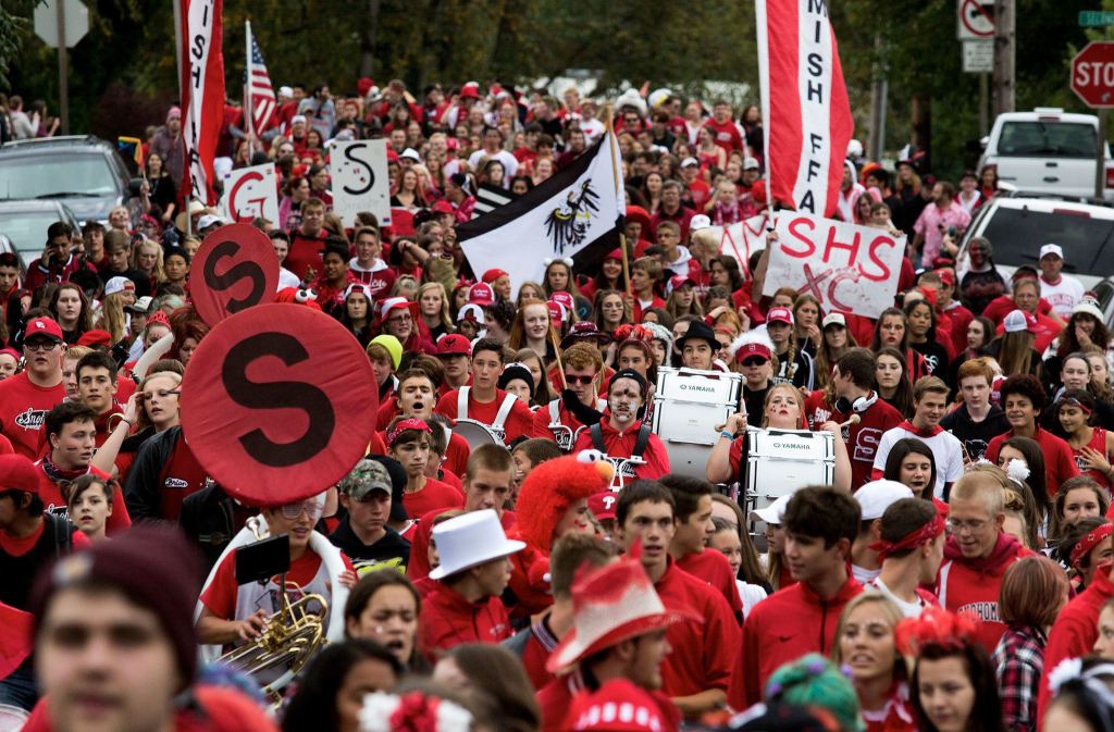 Some 1,500 Snohomish High School students walk in the annual Serpentine Parade on Friday in downtown Snohomish. (Andy Bronson / The Herald)