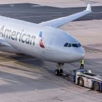 An American Airlines passenger jet is serviced at Frankfurt Airport in Frankfurt, Germany, in 2015. (Martin Leissl / Bloomberg)