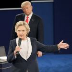 Republican presidential nominee Donald Trump listens to Democratic presidential nominee Hillary Clinton during the second presidential debate at Washington University in St. Louis on Sunday. (AP Photo/John Locher)