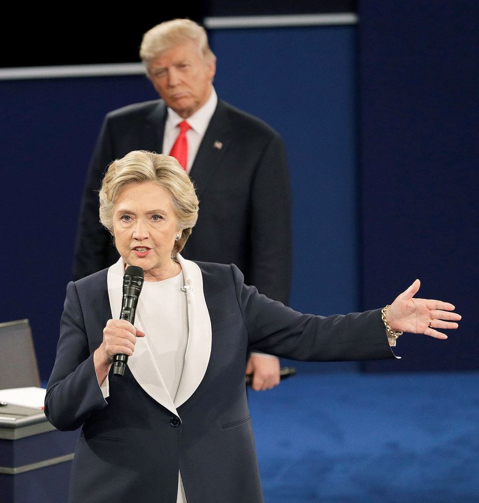 Republican presidential nominee Donald Trump listens to Democratic presidential nominee Hillary Clinton during the second presidential debate at Washington University in St. Louis on Sunday. (AP Photo/John Locher)