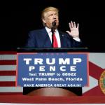 Republican presidential nominee Donald Trump speaks Thursday during a campaign rally in West Palm Beach, Florida. (AP Photo/ Evan Vucci)