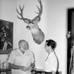 In this Sept. 2, 1954, photo, Luis Miguel Dominguin, right, retired Spanish bullfighter, visits with U.S. author Ernest Hemingway at Hemingway&rsquo;s home in San Francisco de Paula, Cuba. (AP Photo/File)