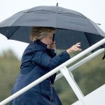 Democratic presidential candidate Hillary Clinton boards her campaign plane in White Plains, New York, on Sunday to travel to St. Louis for the second presidential debate. (AP Photo/Andrew Harnik)