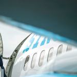 Democratic presidential candidate Hillary Clinton arrives at Boeing Field Airport in Seattle on Friday. (AP Photo/Andrew Harnik)