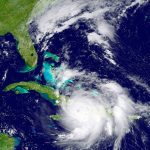 The GOES East satellite image provided by the National Oceanic and Atmospheric Administration, taken Tuesday at 1:12 p.m. EDT, shows Hurricane Matthew over the Caribbean region. Hurricane Matthew roared across the southwestern tip of Haiti with 145 mph winds Tuesday, uprooting trees and tearing roofs from homes in a largely rural corner of the impoverished country as the storm headed north toward Cuba and the east coast of Florida. (NOAA via AP)