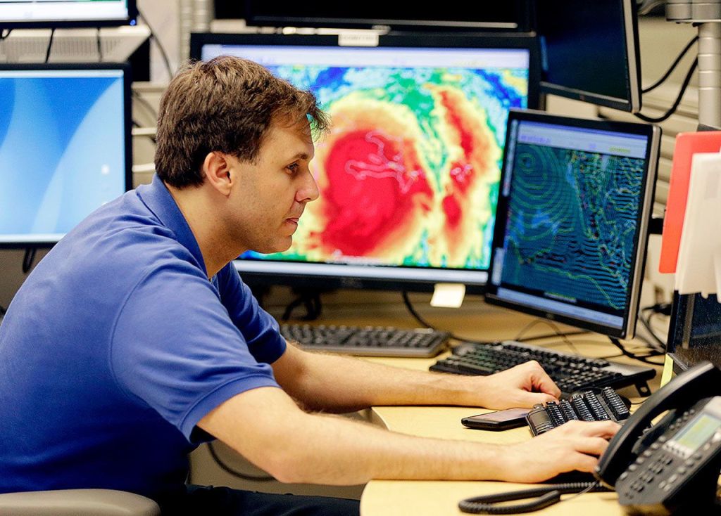 Hurricane specialist Eric Blake monitors the path of Hurricane Matthew at the National Hurricane Center on Tuesday in Miami. (AP Photo/Lynne Sladky)