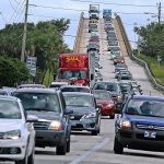 People in vehicles make an evacuation route over 520 bridge heading west from Merritt Island, Florida, on Wednesday, as Hurricane Matthew approaches Florida. (Red Huber/Orlando Sentinel via AP)