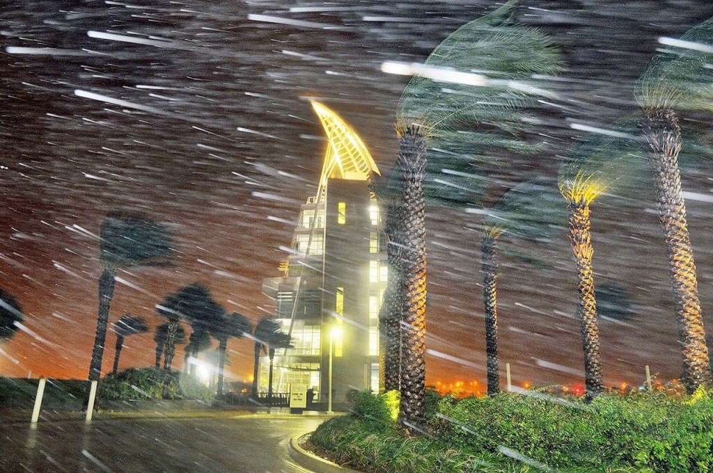 Trees sway in heavy rain and wind from Hurricane Matthew in front of Exploration Tower early Friday at Cape Canaveral, Florida. (Craig Rubadoux/Florida Today via AP)
