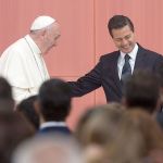 Pope Francis speaks as Mexican President Enrique Pena Nieto reacts during a welcoming ceremony at The National Palace in Mexico City on Feb. 13. (Bloomberg/Susana Gonzalez)