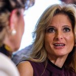 Summer Zervos speaks alongside her attorney Gloria Allred during a news conference in Los Angeles on Friday. (AP Photo/Ringo Chiu)