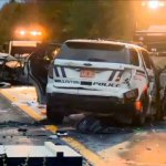 In this still image from video provided by WCAX-TV, workers remove vehicles from Interstate 89 early Sunday in Williston, Vermont, after a wrong-way driver caused a crash. (WCAX-TV via AP)
