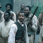 This image released by Fox Searchlight Films shows Nate Parker as Nat Turner, center, in a scene from &ldquo;The Birth of a Nation.&rdquo; (Jahi Chikwendiu/Fox Searchlight via AP)