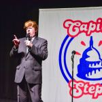 A Capitol Steps cast member playing Donald Trump sings &ldquo;Shut Up and Vote For Me.&rdquo;