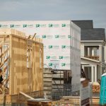Contractors build wood framing for a house under construction in Louisville, Kentucky, in May. (Luke Sharrett / Bloomberg)
