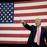 Republican presidential candidate Donald Trump takes the stage Saturday at a rally in Manheim, Pennsylvania. (AP Photo/John Locher)