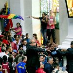 A group of government supporters force themselves into at the National Assembly in Caracas, Venezuela, on Sunday, Oct. 23. Government supporters interrupted a special congressional session where lawmakers were discussing bringing legal charges against President Nicolas Maduro. (AP Photo/Ariana Cubillos)