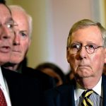 In this Sept. 7 photo, Senate Majority Leader Mitch McConnell of Kentucky listens at right as Sen. John Barrasso, R-Wyo., left, speaks during a news conference on Capitol Hill in Washington. Senate Majority Whip John Cornyn of Texas is at center. Senate confirmation of President Barack Obama&rsquo;s nominees slowed to a halt this election year. (AP Photo/Susan Walsh, File)