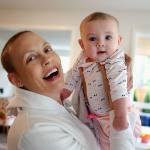 Apryl Roberts joyfully holds up her 4-month-old daughter, Haven, Wednesday at her home in Lynnwood. (Dan Bates / The Herald)