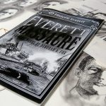 In her home studio, commercial artist Deb Fox created a graphic novel based on the Everett Massacre. The artist made charcoal drawings of scenes and characters, using historic photographs for reference. (Dan Bates / The Herald)